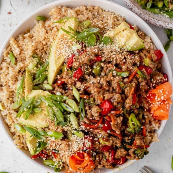 teriyaki turkey rice bowl with avocado and green onions